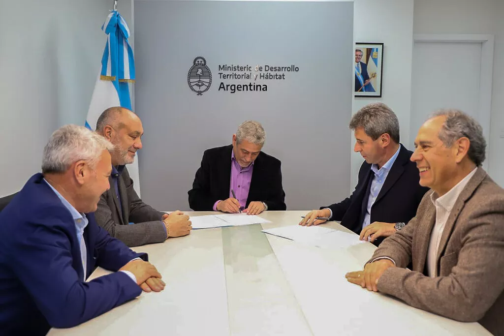 firma convenio uñac ferraresi viviendas ortiz andino robert garce marcelo yornet